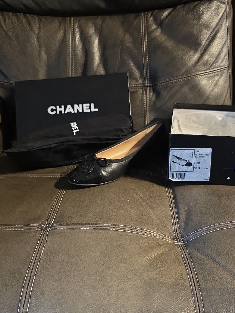 CHANEL Black Leather Quilted Cap-Toe Ballet Flat with Bow